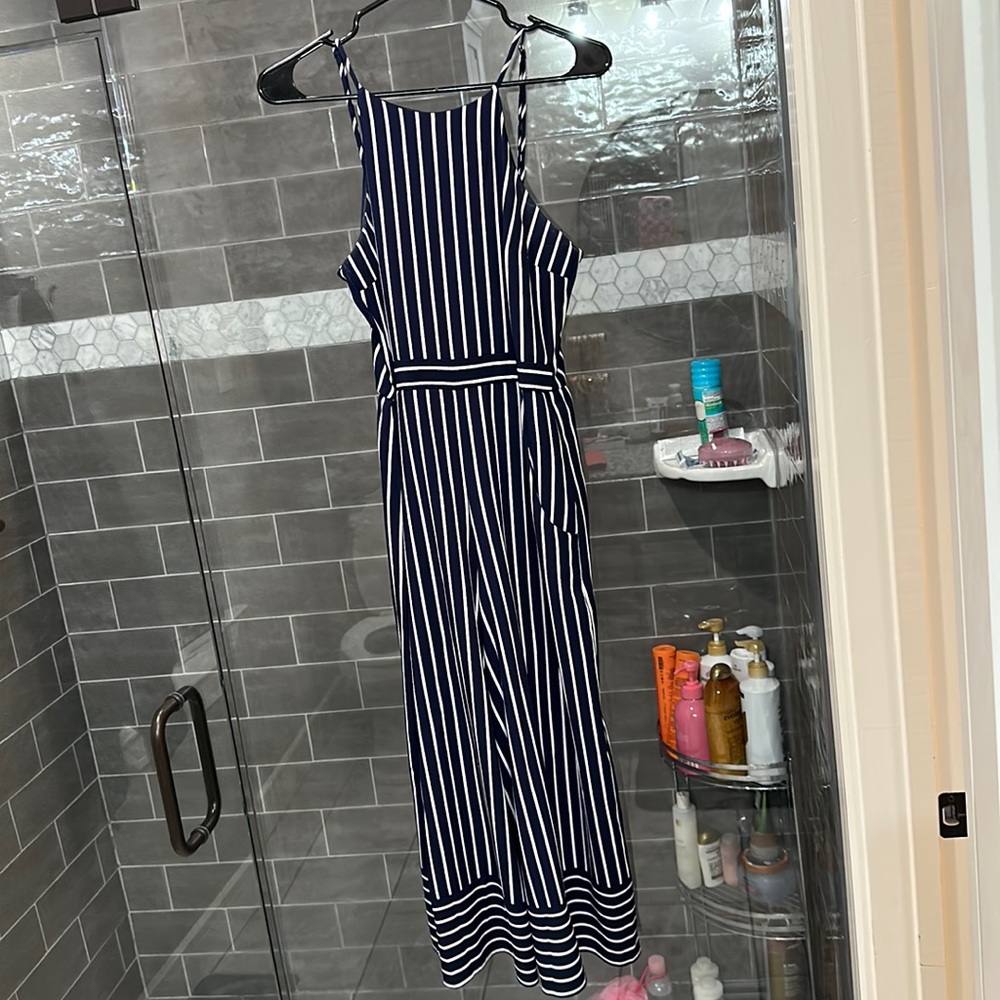Navy blue and white striped pantsuit.